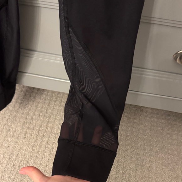 lululemon athletica Black High-Rise Leggings with mesh leg cutouts - Picture 2 of 6